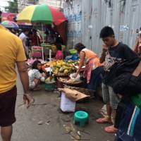 Malunggay, at the mercado, shopping