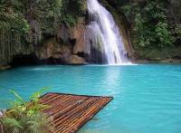 Kawasan Falls is a three tiered cascade of crystal clear waterfalls