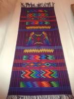 making a traditional rug in guatemala