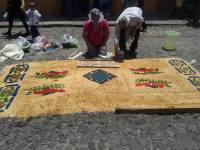 making a traditional rug in guatemala