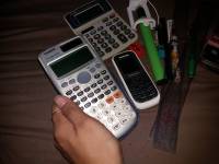 Casio and aurora calculator, samsung keystone, 2 rulers , monopod, ballpen, sharpener, tpu band